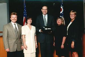 Ohio ACEP protects the Head of State by presenting Gov. Bob Taft with his very own bike helmet